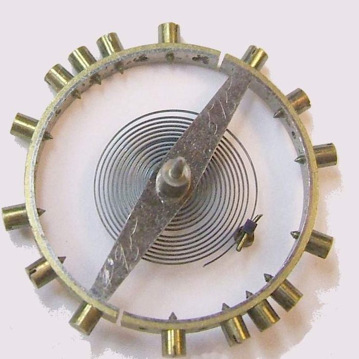 Pocket watch balance wheel with coiled hairspring