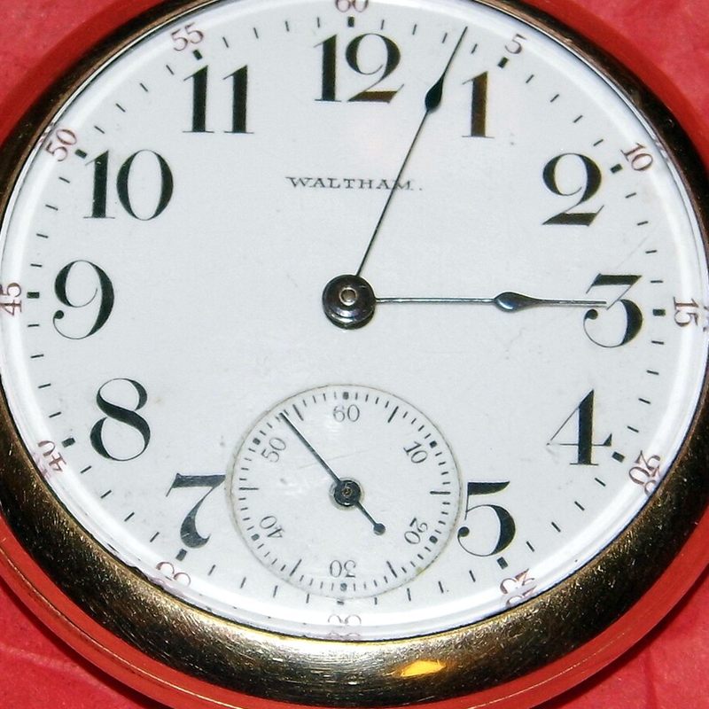 Waltham pocket watch dial with white enamel face and blued-steel hands